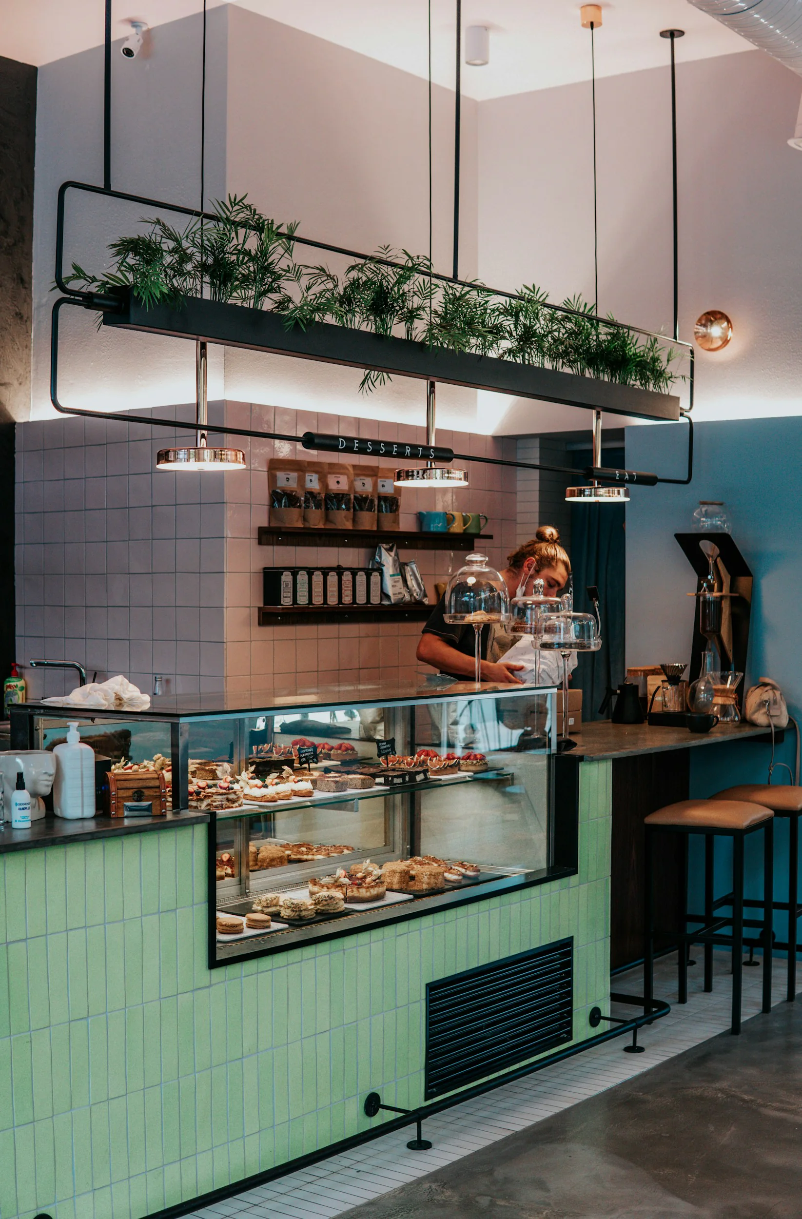 Bright cafe interior with a pastry counter